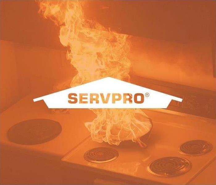 SERVPRO logo with a kitchen fire on the stove.